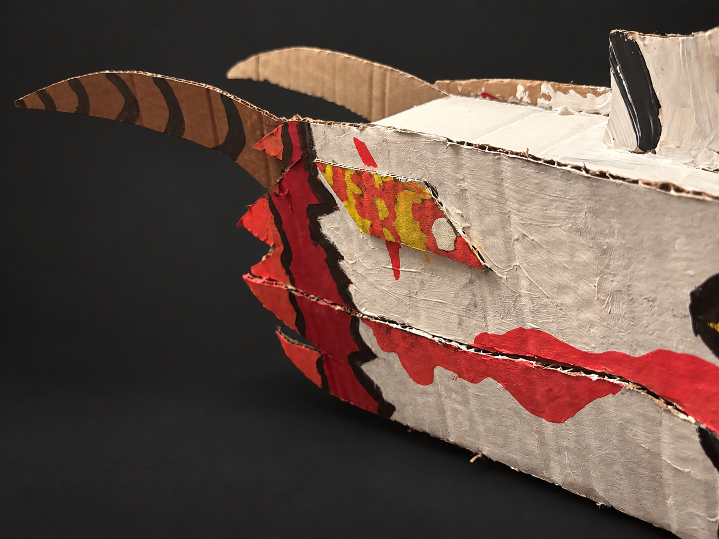 Close detail of Emboro's paint and horns
